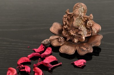 eCraftIndia Lord Ganesha on Flower Decorative Showpiece  -  7.62 cm(Aluminium, Brown)