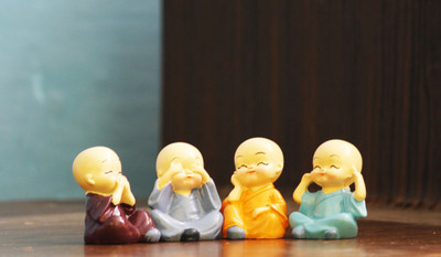 Miss Peach Handcrafted Resin Tiny Serenity:Mini Baby Monk Buddha Figurine For Car Dashboard Decorative Showpiece  -  6.5 cm(Polyresin, Multicolor)