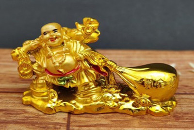 RASHMI CREATION Feng Shui Gold Laughing buddha drag money potli for wealth & Happiness Decorative Showpiece  -  7.5 cm(Polyresin, Gold)