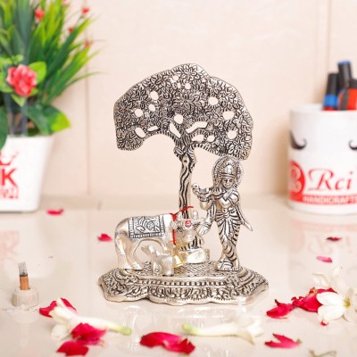 DreamKraft Plated Kamdhenu Cow with Krishna Standing Under Tree Plying Flute Metal Statue Decorative Showpiece  -  16 cm(Metal, Silver)