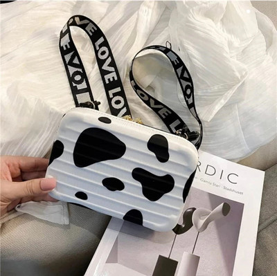 CARRY CARAT Multicolor Sling Bag suitcase bag cow white
