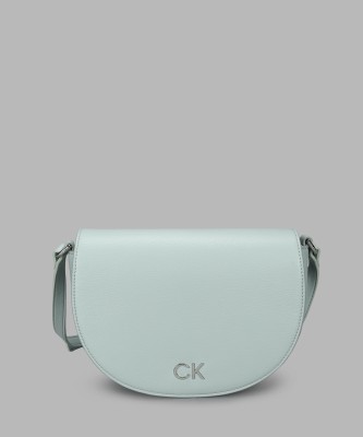 Calvin Klein Grey Sling Bag CK DAILY SADDLE BAG PEBBLE