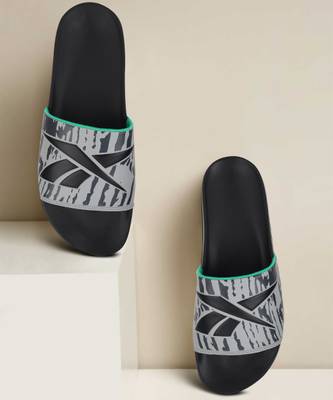 Reebok slides black store