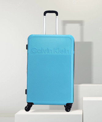 Calvin Klein Medium Check-in Suitcase (68 Cm) 8 Wheels – EXPRESSION – Blue For Rs. 6099 @ 79 %