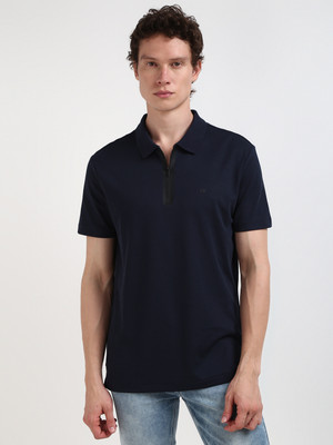 Calvin Klein Jeans Solid Men Polo Neck Navy Blue T-Shirt