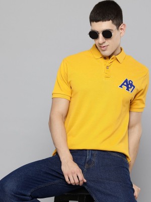 AEROPOSTALE Solid Men Polo Neck Yellow T-Shirt