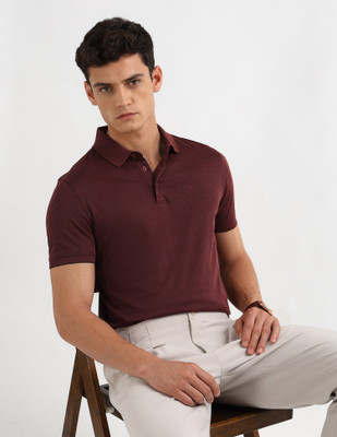 ARROW Solid Men Polo Neck Maroon T-Shirt