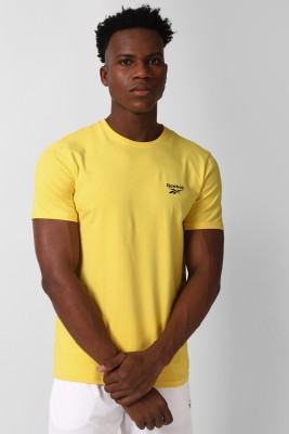 REEBOK Solid Men Round Neck Yellow T-Shirt