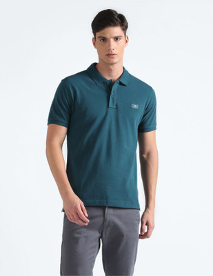 FLYING MACHINE Solid Men Polo Neck Blue T-Shirt