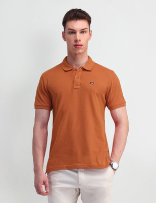 Arrow Sport Solid Men Polo Neck Orange T-Shirt