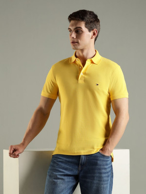 TOMMY HILFIGER Solid Men Polo Neck Yellow T-Shirt