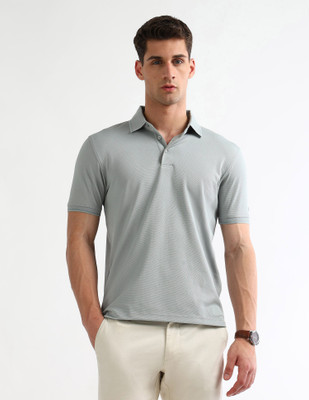 ARROW Solid Men Polo Neck Green T-Shirt