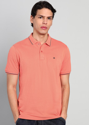 Raymond Solid Men Polo Neck Pink T-Shirt