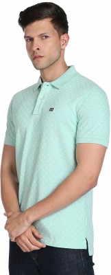 Arrow Sport Solid Men Polo Neck Green T-Shirt