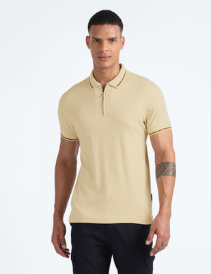 FLYING MACHINE Solid Men Polo Neck Beige T-Shirt