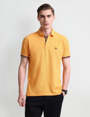 Arrow Sport Solid Men Polo Neck Yellow T-Shirt