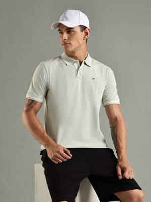 TOMMY HILFIGER Solid Men Polo Neck Green T-Shirt