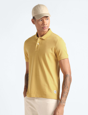 FLYING MACHINE Solid Men Polo Neck Yellow T-Shirt