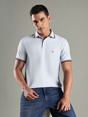 TOMMY HILFIGER Solid Men Polo Neck Light Blue T-Shirt