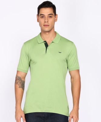 PARK AVENUE Solid Men Polo Neck Green T-Shirt