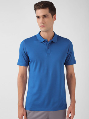REEBOK Solid Men Polo Neck Blue T-Shirt