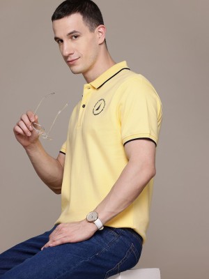 NAUTICA Solid Men Polo Neck Yellow T-Shirt