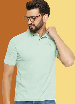 Nuovo Solid Men Polo Neck Light Blue T-Shirt