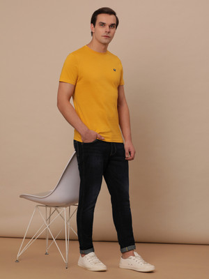 Wrangler Solid Men Round Neck Yellow T-Shirt