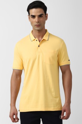 VAN HEUSEN Solid Men Polo Neck Yellow T-Shirt