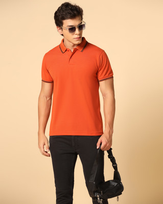 INKKR Solid Men Polo Neck Orange T-Shirt
