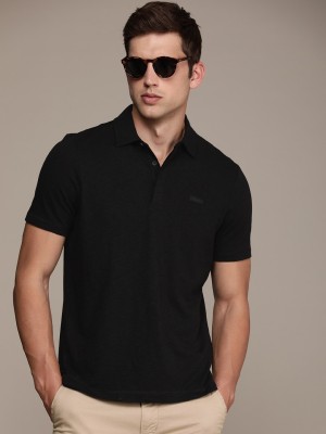 Calvin Klein Jeans Solid Men Polo Neck Black T-Shirt