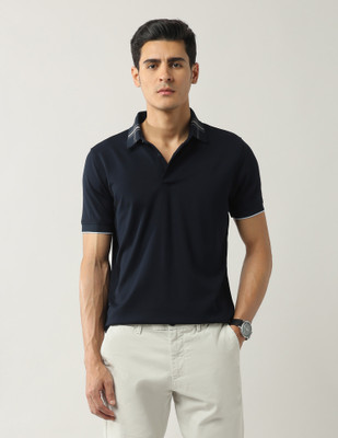 ARROW Solid Men Polo Neck Blue T-Shirt