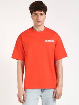 Calvin Klein Jeans Printed, Solid Men Round Neck Orange T-Shirt