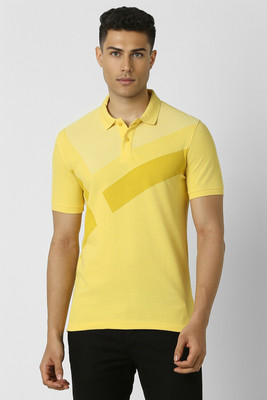 VAN HEUSEN Solid Men Polo Neck Yellow T-Shirt