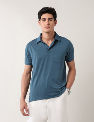 ARROW Solid Men Polo Neck Green T-Shirt