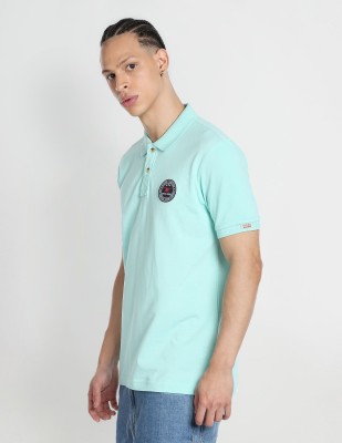 FLYING MACHINE Solid Men Polo Neck Green T-Shirt