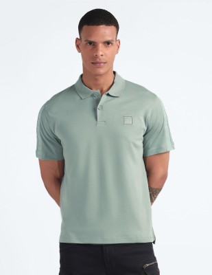 FLYING MACHINE Solid Men Polo Neck Green T-Shirt