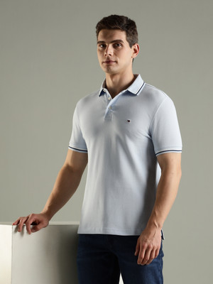 TOMMY HILFIGER Solid Men Polo Neck Light Blue T-Shirt
