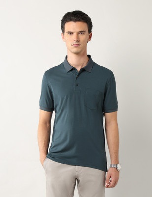 ARROW Solid Men Polo Neck Green T-Shirt