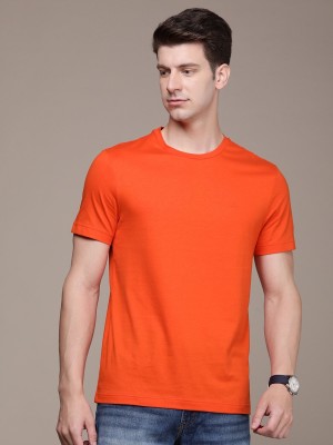 Calvin Klein Jeans Solid Men Round Neck Orange T-Shirt