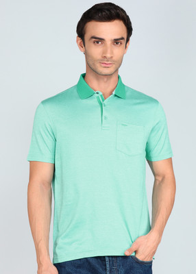 PARK AVENUE Solid Men Polo Neck Dark Green T-Shirt