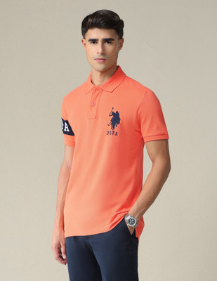 U.S. POLO ASSN. Solid Men Polo Neck Orange T-Shirt