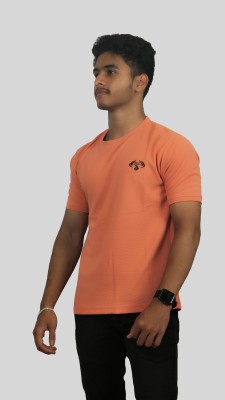 EAGLE ESSENCE Solid Men Round Neck Orange T-Shirt