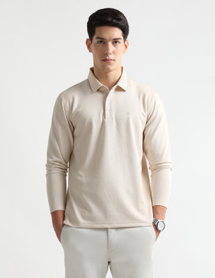 ARROW Solid Men Polo Neck Beige T-Shirt