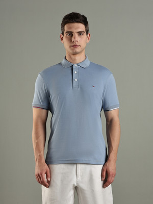 TOMMY HILFIGER Solid Men Polo Neck Light Blue T-Shirt
