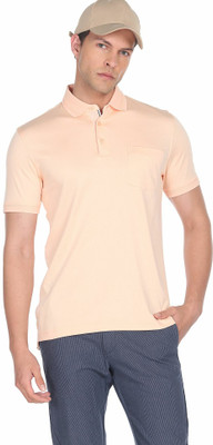 ARROW Solid Men Polo Neck Orange T-Shirt