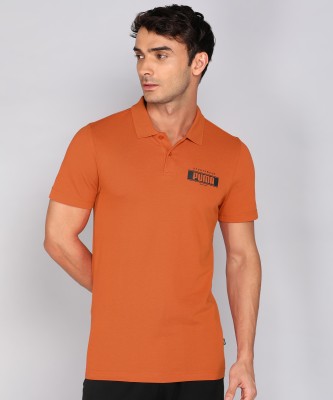 PUMA Solid Men Polo Neck Orange T-Shirt