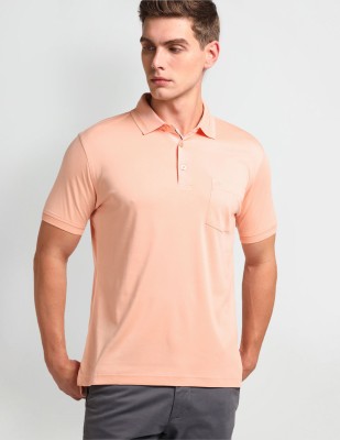 ARROW Solid Men Polo Neck Orange T-Shirt