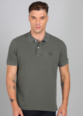 DIESEL Solid Men Polo Neck Green T-Shirt
