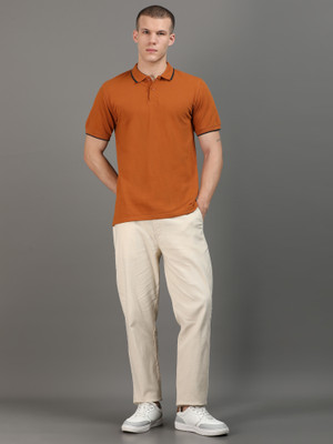 VS exclusive Solid Men Polo Neck Orange T-Shirt